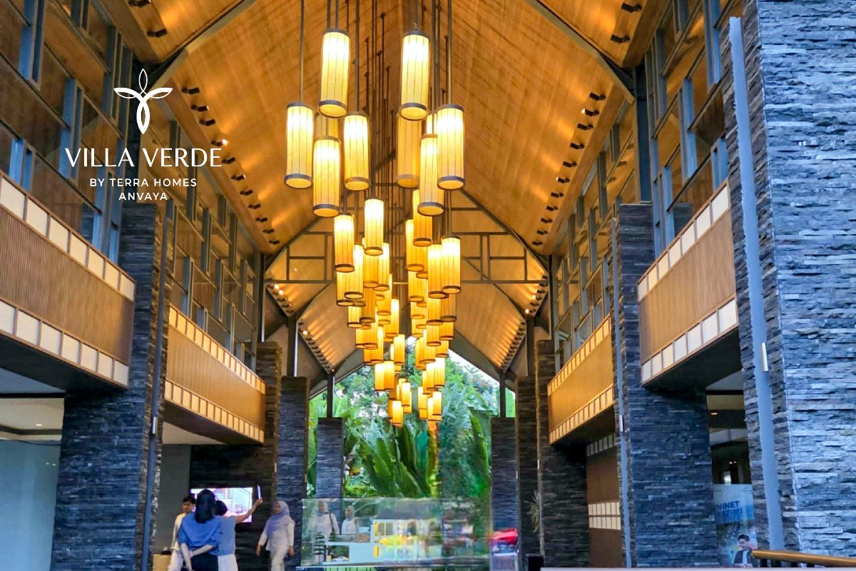 Estate clubhouse lobby with hanging chandeliers